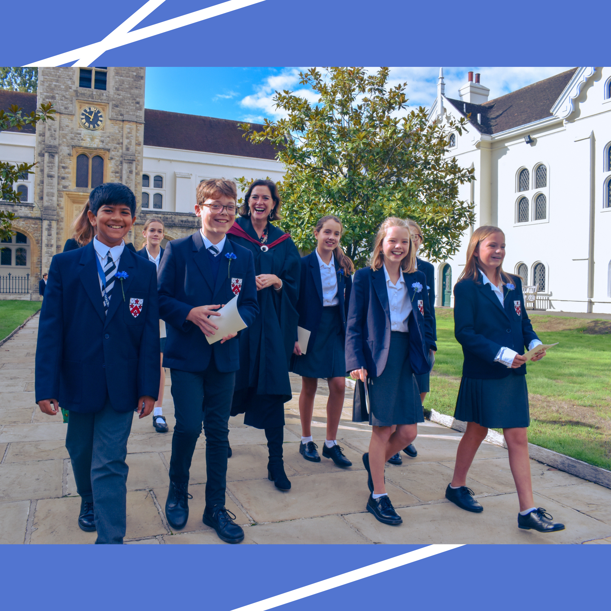 Image of school children and head teacher