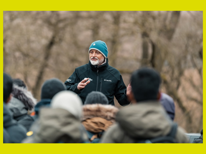 man speaking to group of people 