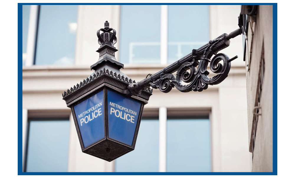 the metropolitan police post sign